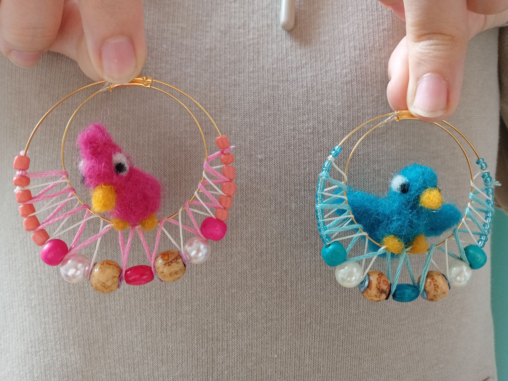 boucle d'oreille bicolore avec oideaux